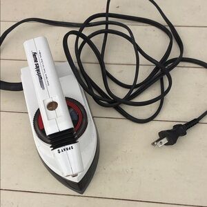 Franzuscfolfing travel iron.Used to travel alot.81 now &no longer travel.